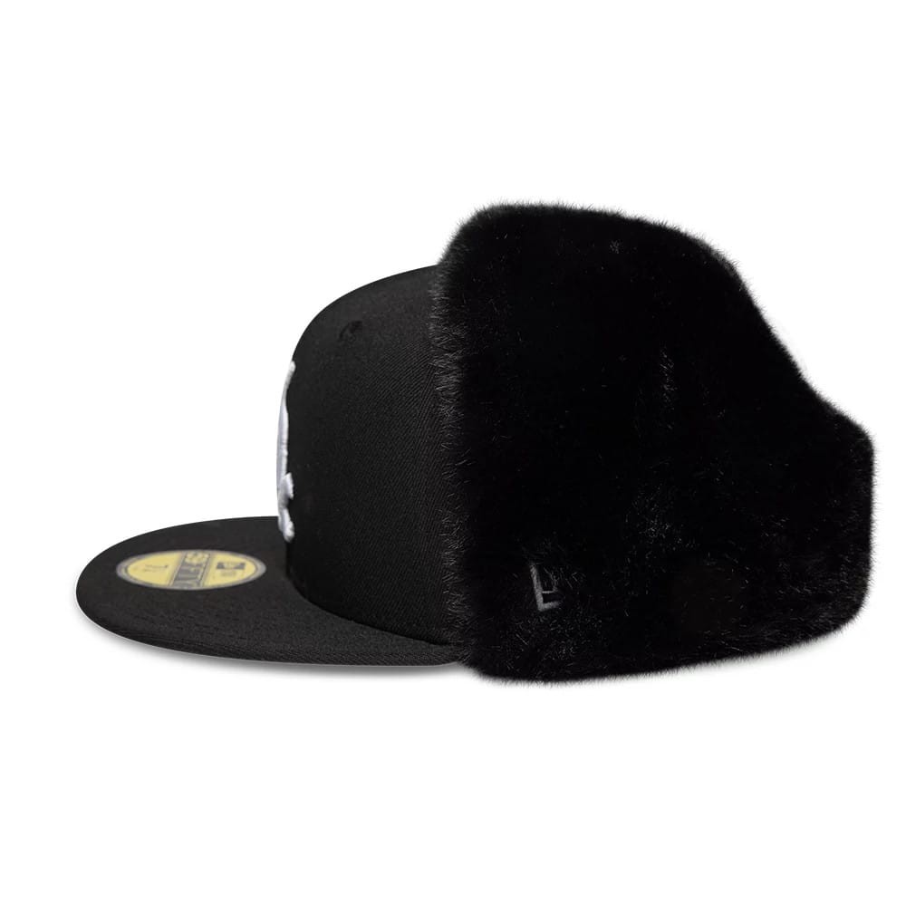 Pictured is this MLB World Series Chicago White Sox Dogear 59FIFTY Fitted cap in black. 10