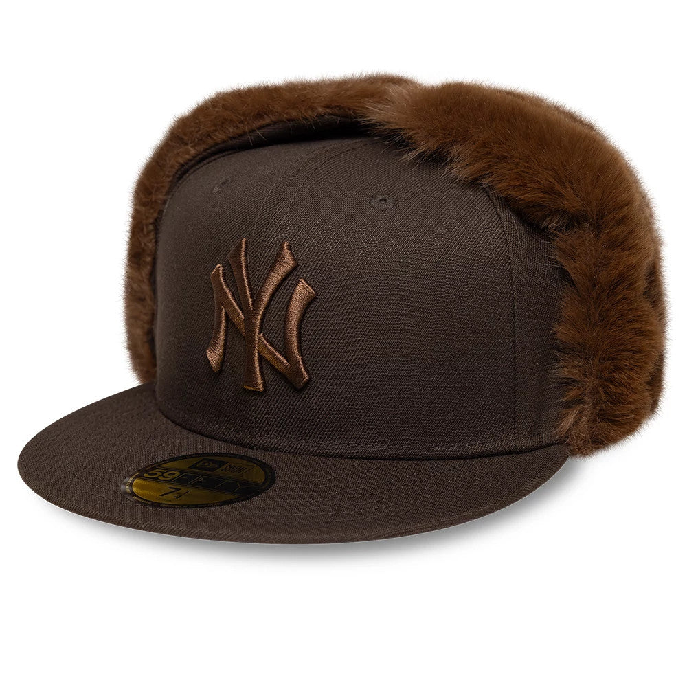 Pictured is this MLB World Series New York Yankees Dogear 59FIFTY Fitted cap in dark brown. 4
