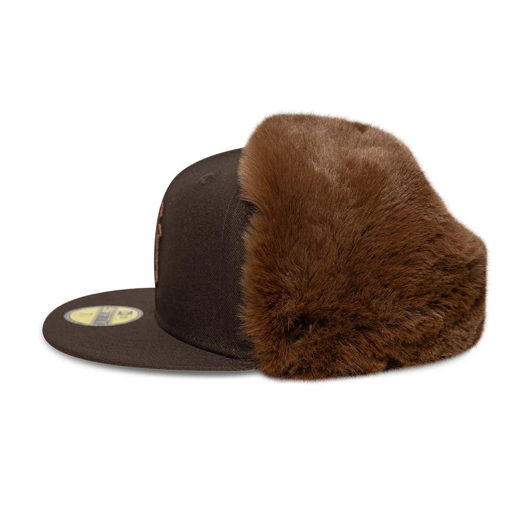 Pictured is this MLB World Series New York Yankees Dogear 59FIFTY Fitted cap in dark brown. 9