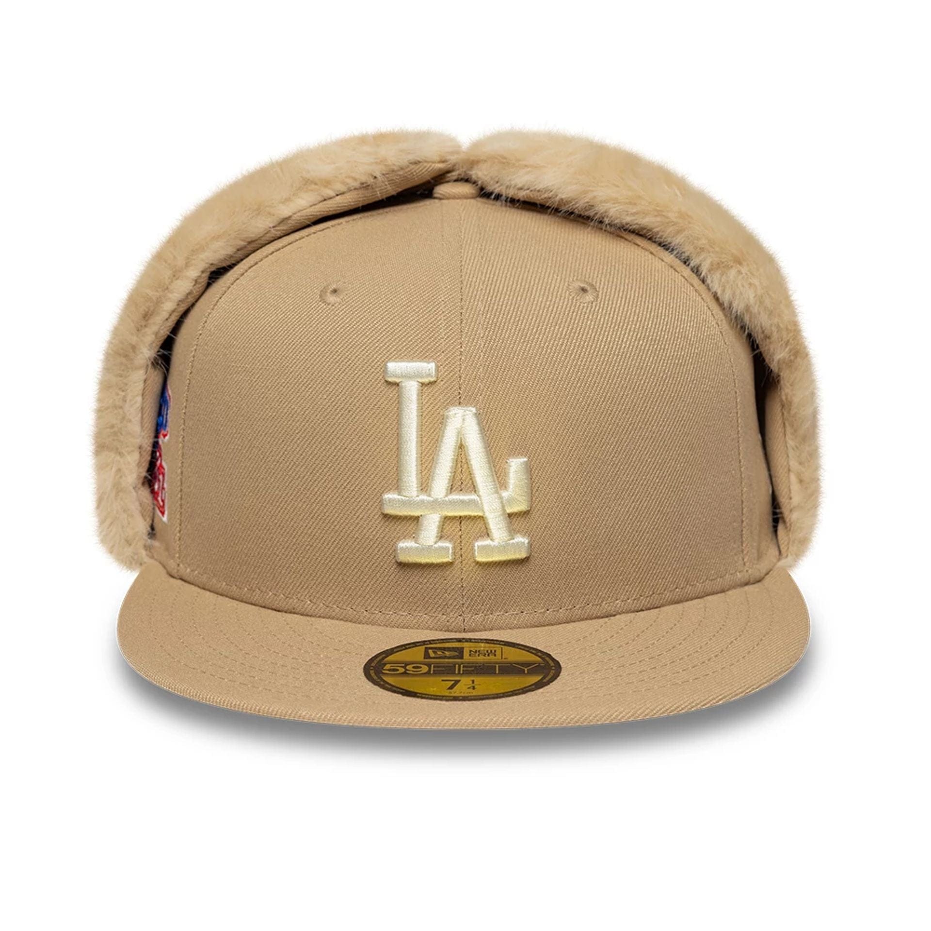 Pictured is this MLB World Series LA Dodgers Dogear 59FIFTY Fitted cap in light beige. 3