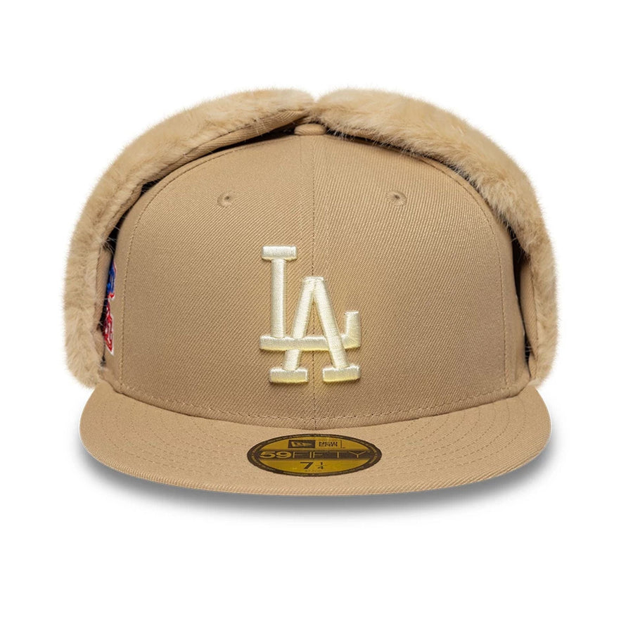 Pictured is this MLB World Series LA Dodgers Dogear 59FIFTY Fitted cap in light beige. 3