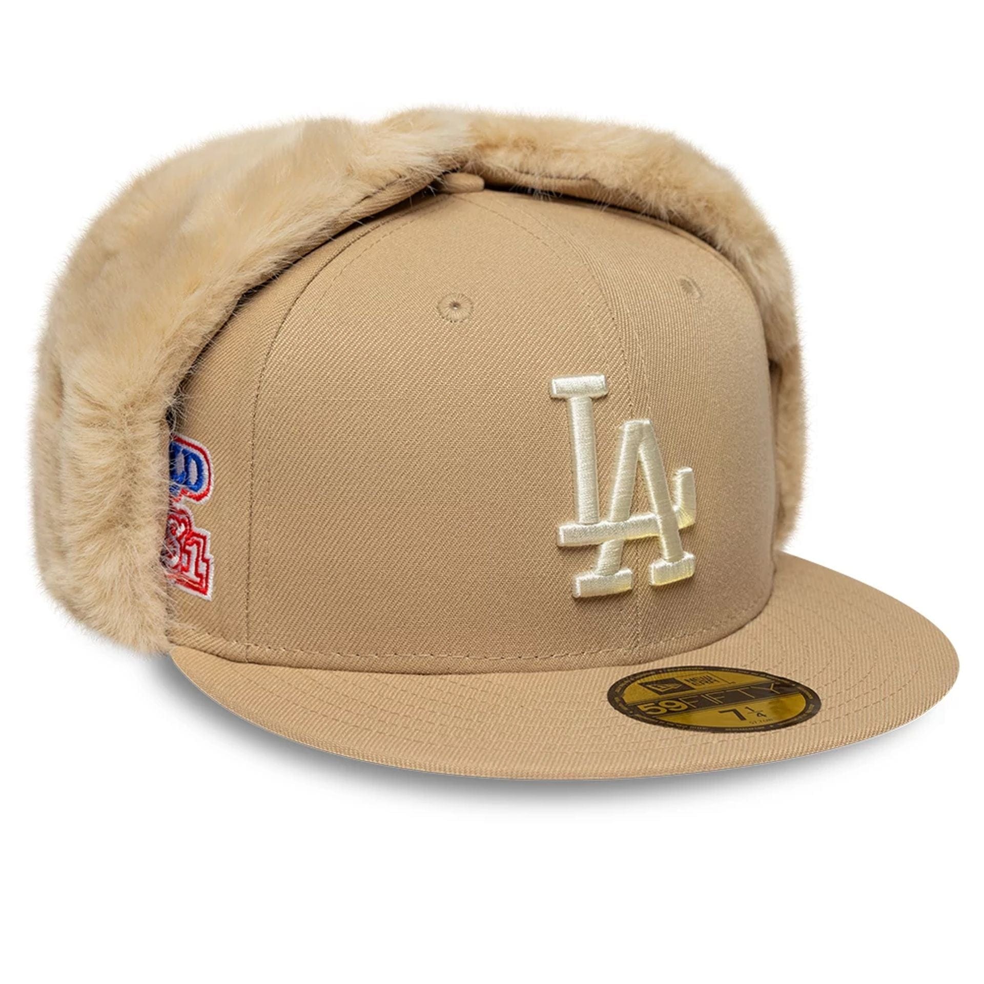 Pictured is this MLB World Series LA Dodgers Dogear 59FIFTY Fitted cap in light beige. 1