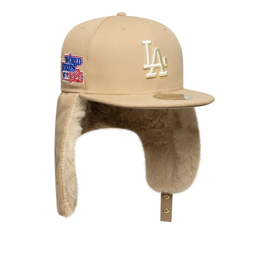 Pictured is this MLB World Series LA Dodgers Dogear 59FIFTY Fitted cap in light beige. 2