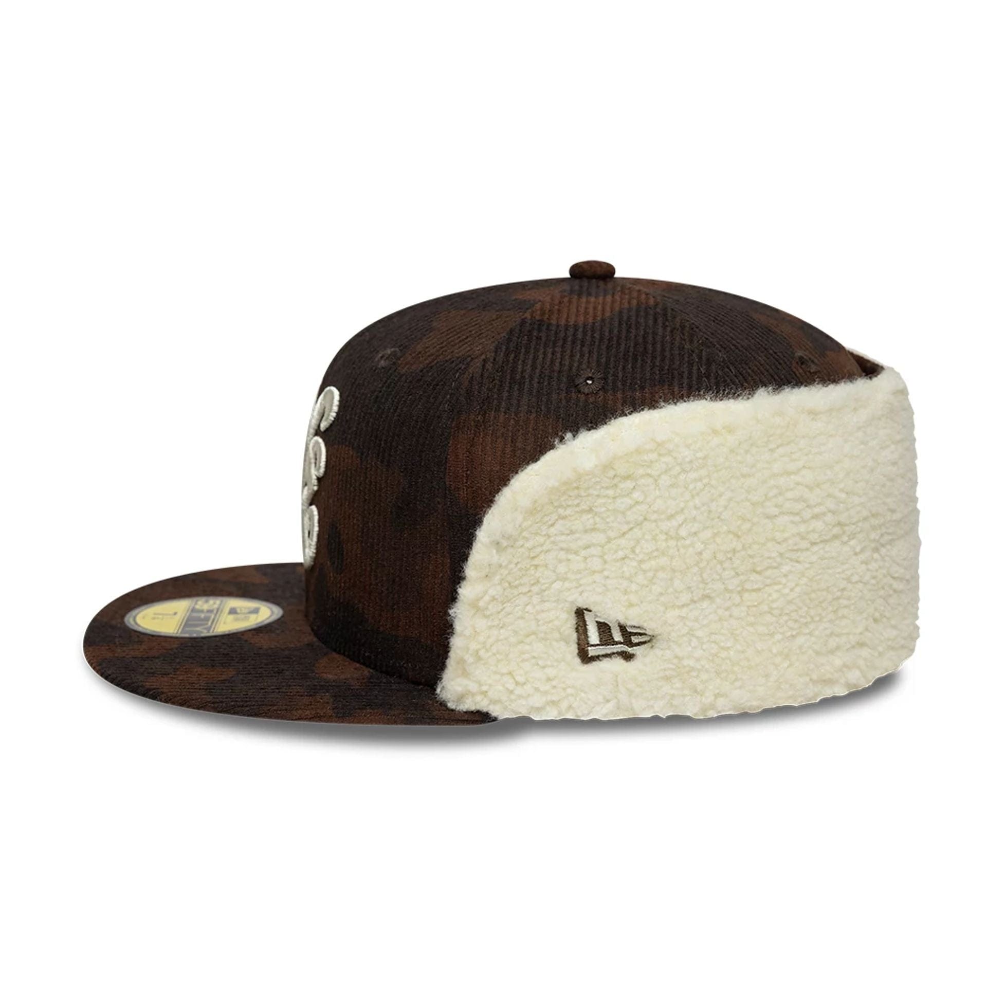 Pictured is this New Era Cord Downflap 59FIFTY Fitted cap in dark brown. 8