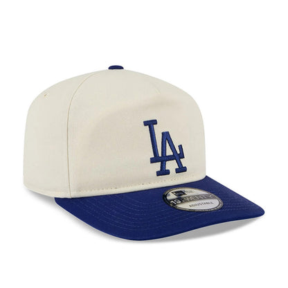 LA Dodgers MLB 2 Tone Washed Cream New Era 19TWENTY Adjustable Cap, three-quarter view showing blue LA logo embroidered on the cream front panel, blue curved visor with 19TWENTY size sticker, and matching top button.