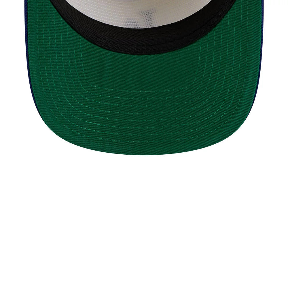 LA Dodgers MLB 2 Tone Washed Cream New Era 19TWENTY Adjustable Cap, inside view showing the green undervisor with detailed stitching lines, contrasted by a black sweatband and cream crown interior.