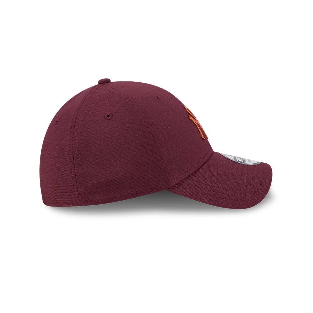 Pictured is this MLB Frosted Rust New York Yankees 39THIRTY Stretch Fit cap in dark red. 6
