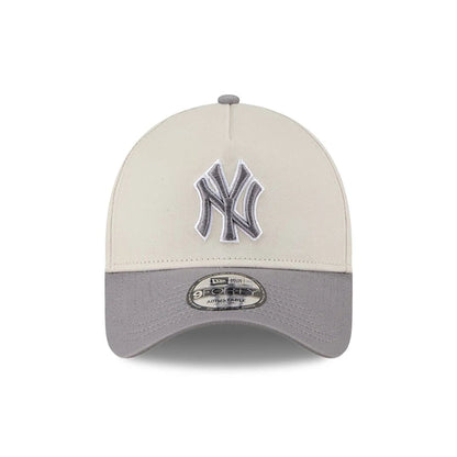 Pictured is this MLB Stone Storm New York Yankees 9FORTY A-Frame cap in light beige. 2