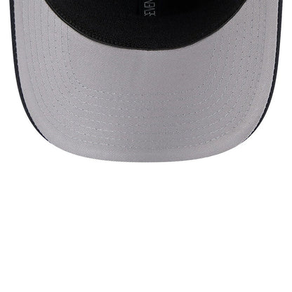 New York Yankees MLB Navy New Era 9SEVENTY Stretch Snap Adjustable Cap, inside view showing a grey undervisor with white stitching and a contrasting black inner sweatband, through the curved visor edge.