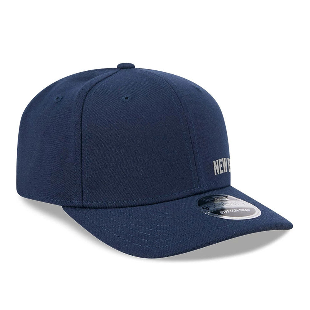 Pictured is this New Era Flawless 9SEVENTY Stretch Snap cap in dark blue. 4