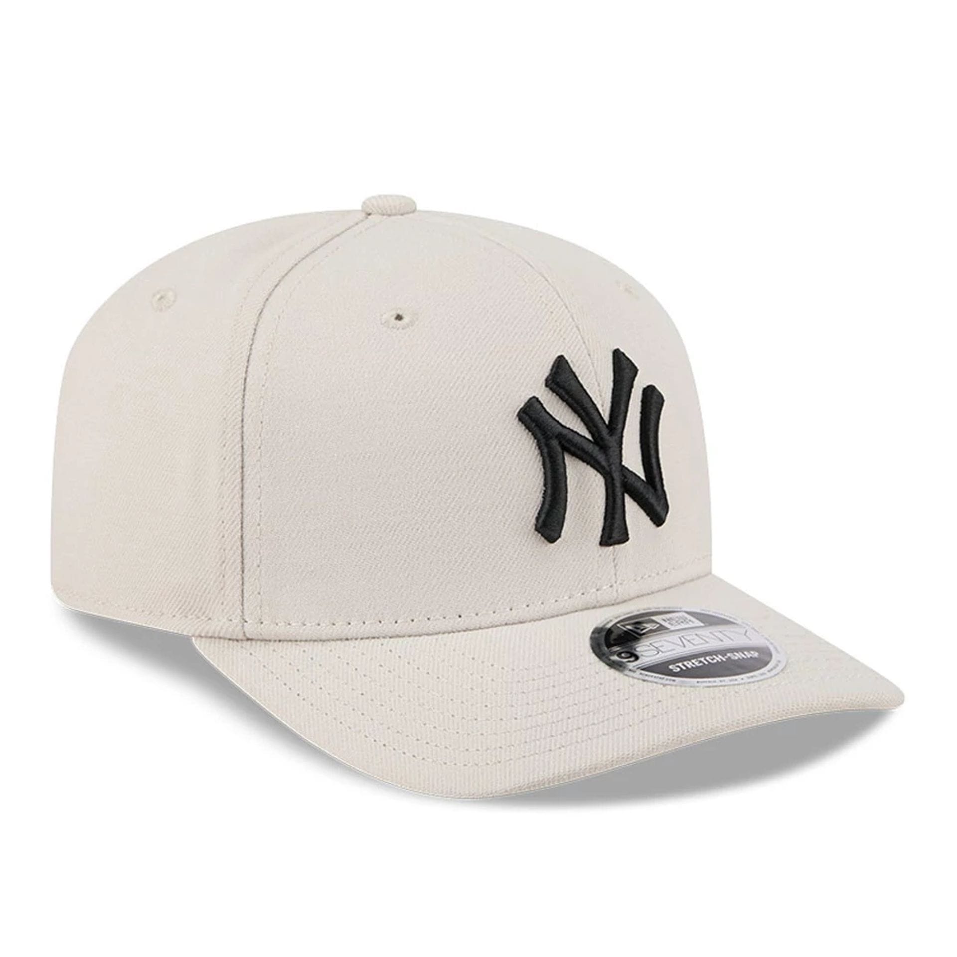 Pictured is this MLB New York Yankees 9SEVENTY Stretch Snap cap in light beige. 4