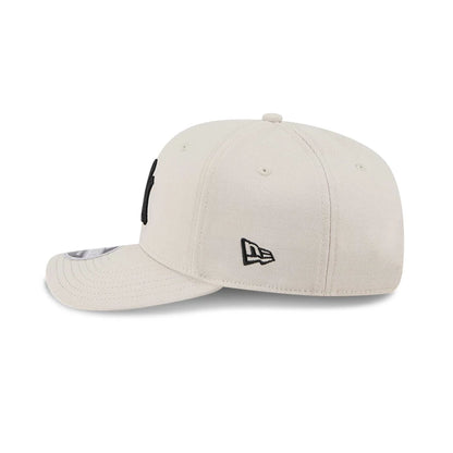 Pictured is this MLB New York Yankees 9SEVENTY Stretch Snap cap in light beige. 5