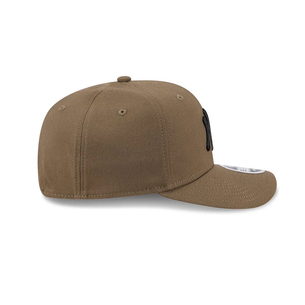 Pictured is this MLB New York Yankees 9SEVENTY Stretch Snap cap in brown. 5