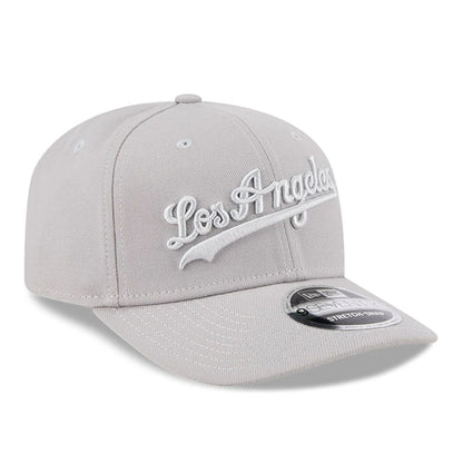 Pictured is this MLB Script LA Dodgers 9SEVENTY Stretch Snap cap in grey. 3