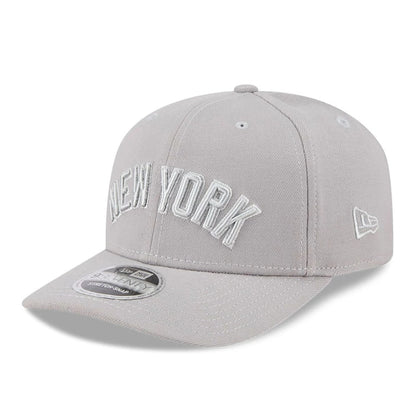 Pictured is this MLB Script New York Yankees 9SEVENTY Stretch Snap cap in grey. 1
