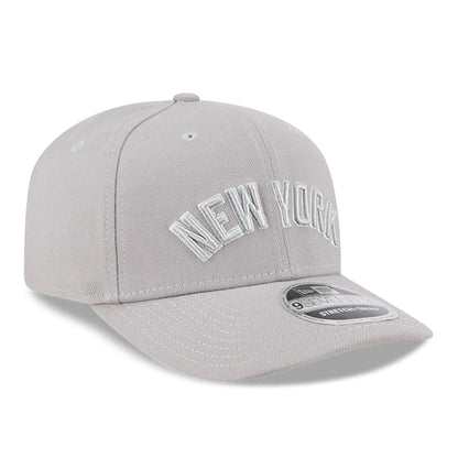 Pictured is this MLB Script New York Yankees 9SEVENTY Stretch Snap cap in grey. 3