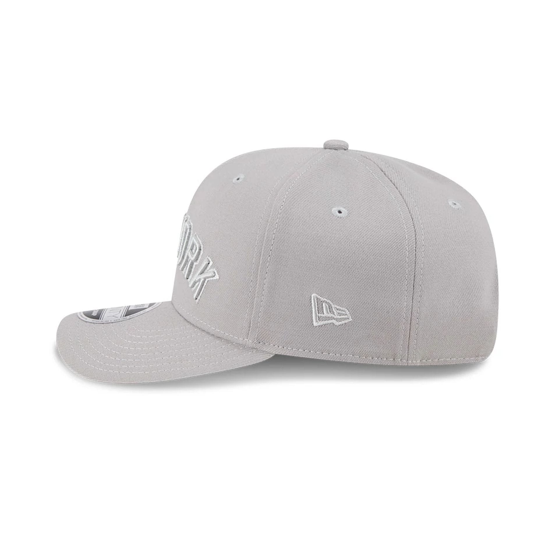 Pictured is this MLB Script New York Yankees 9SEVENTY Stretch Snap cap in grey. 4
