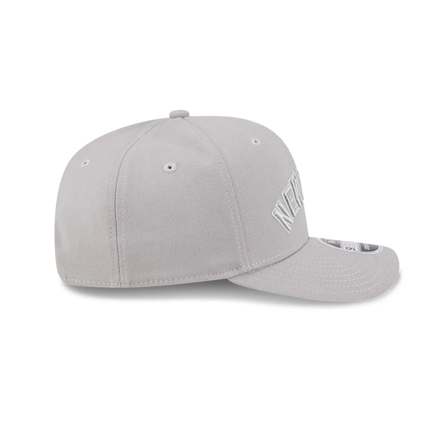 Pictured is this MLB Script New York Yankees 9SEVENTY Stretch Snap cap in grey. 5