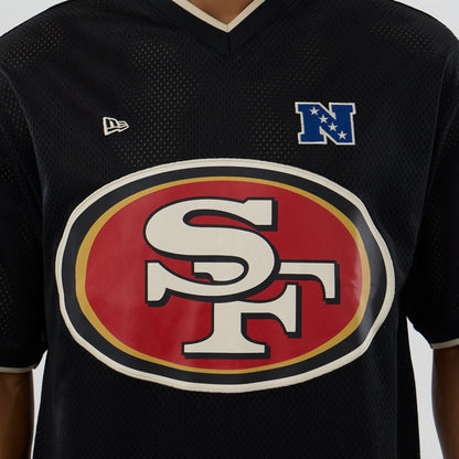 The model is wearing this NFL Mesh San Francisco 49ers Oversized T-Shirt in black. 5