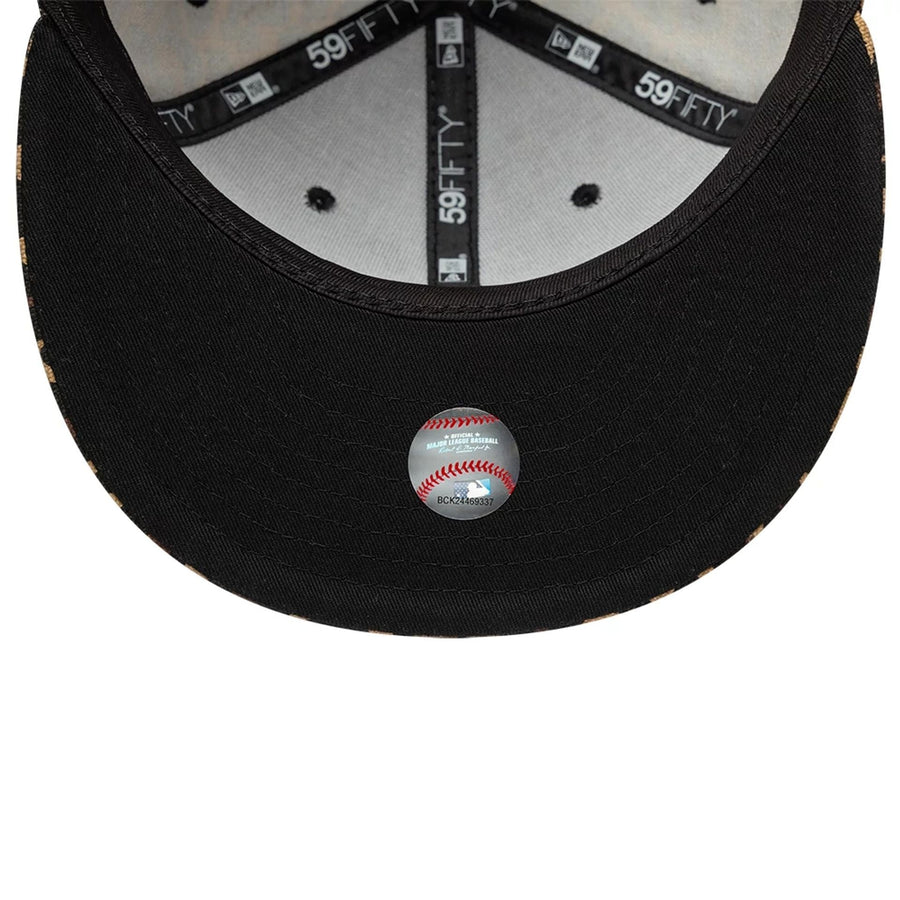 Pictured is this MLB Leopard New York Yankees 59FIFTY Fitted cap in black. 2