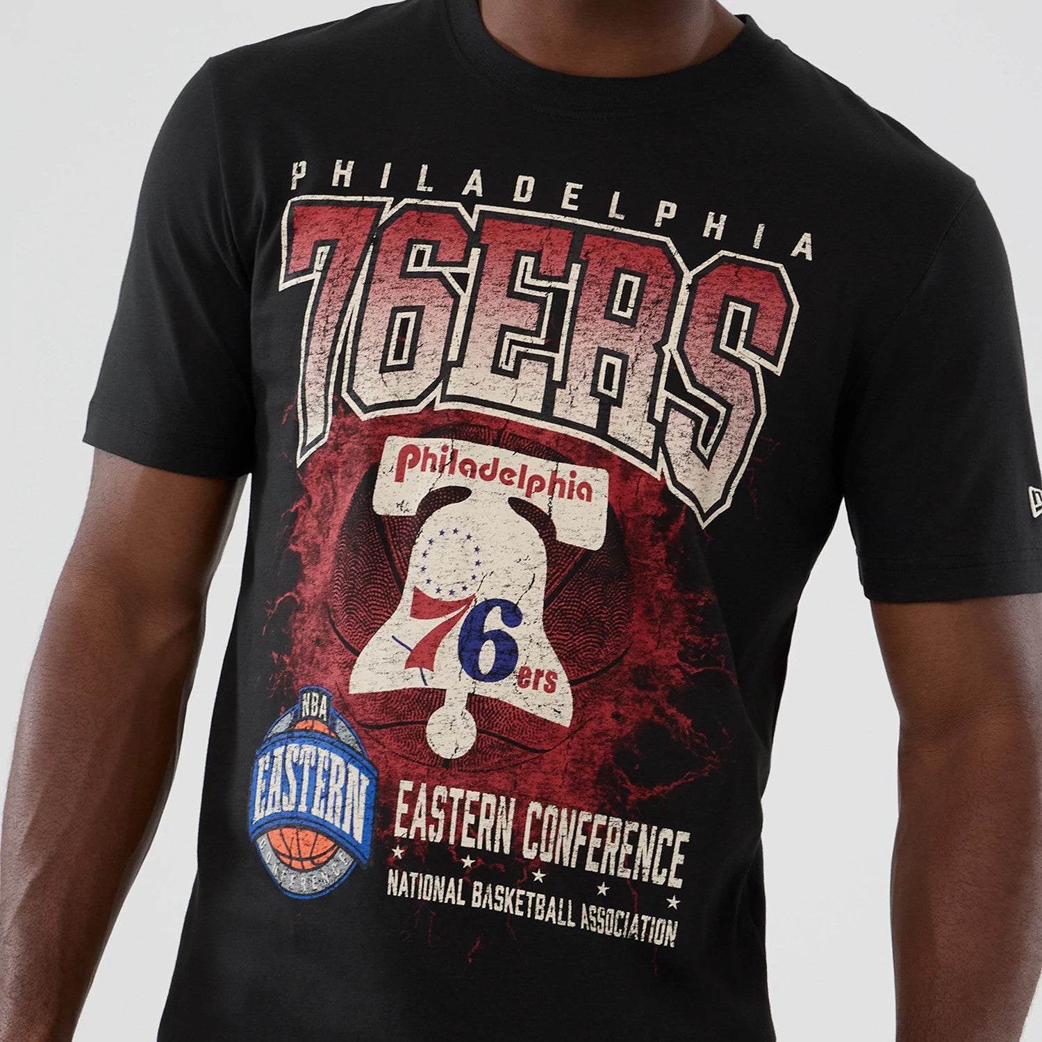 The model is wearing this NBA Hardwood Classic Philadelphia 76ers T-Shirt in black. 3