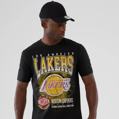 The model is wearing this NBA Hardwood Classic LA Lakers T-Shirt in black. 7