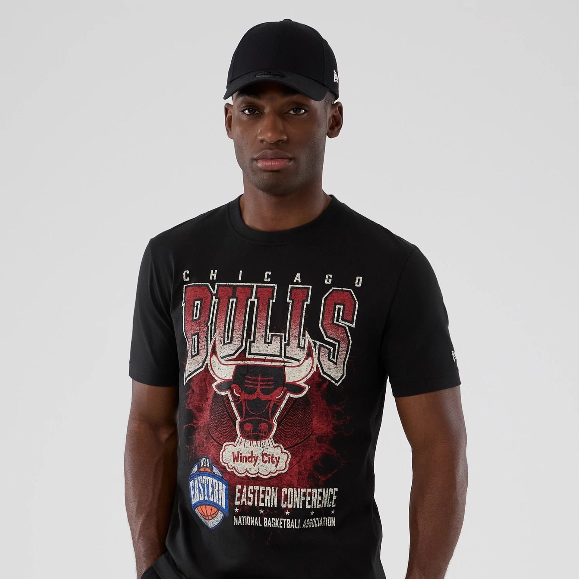 The model is wearing this NBA Hardwood Classic Chicago Bulls T-Shirt in black. 6