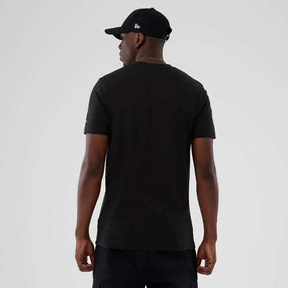 The model is wearing this NBA Hardwood Classic Boston Celtics T-Shirt in black. 2