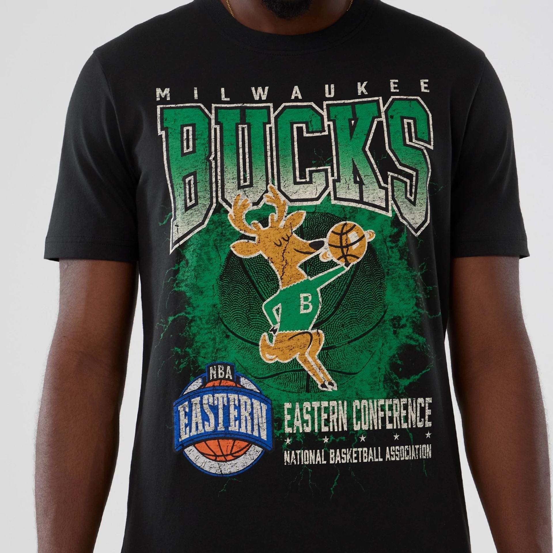 The model is wearing this NBA Hardwood Classic Milwaukee Bucks T-Shirt in black. 3