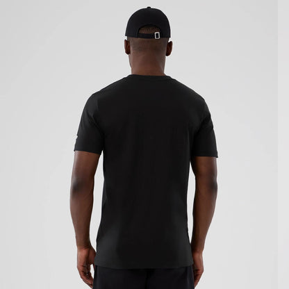 The model is wearing this NBA Hardwood Classic Houston Rockets T-Shirt in black. 2