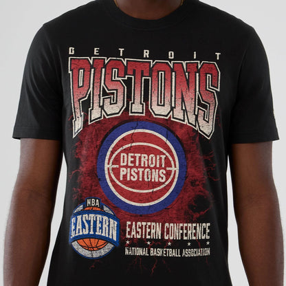 The model is wearing this NBA Hardwood Classic Detroit Pistons T-Shirt in black. 3
