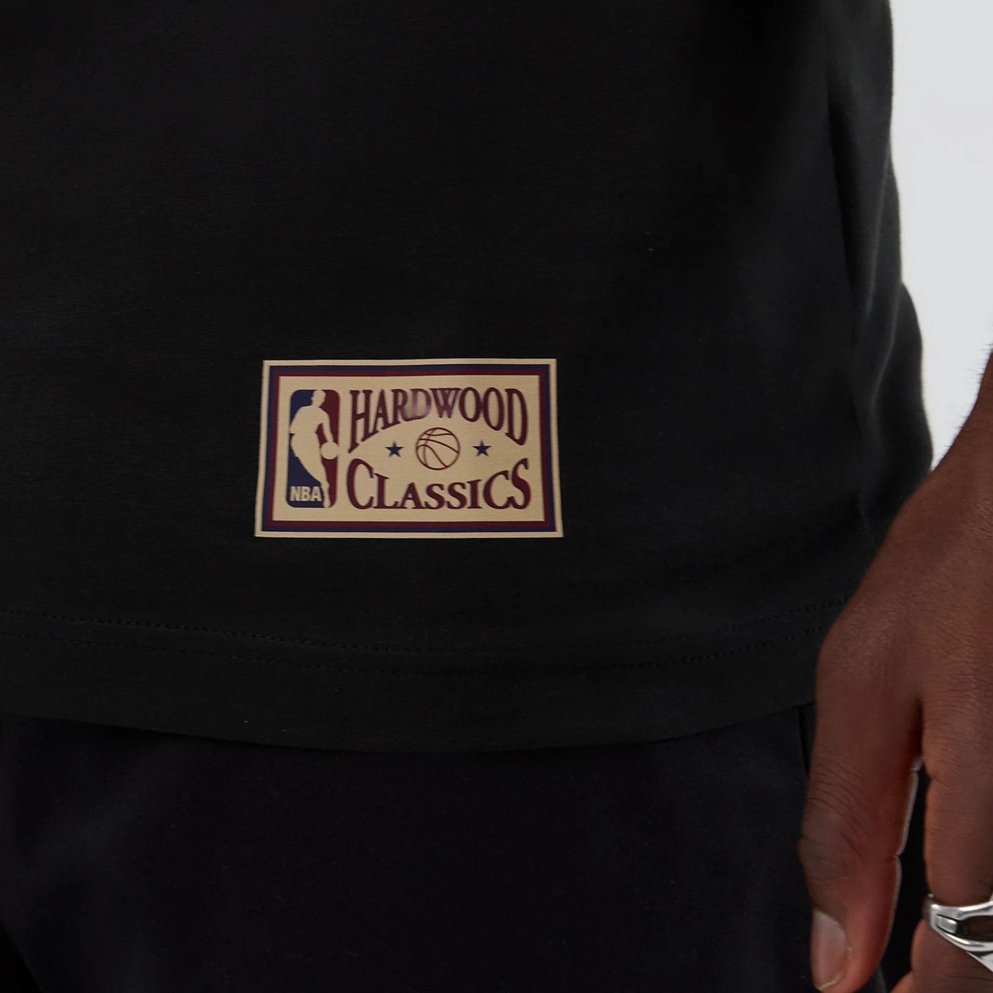 The model is wearing this NBA Hardwood Classic Dallas Mavericks T-Shirt in black. 5