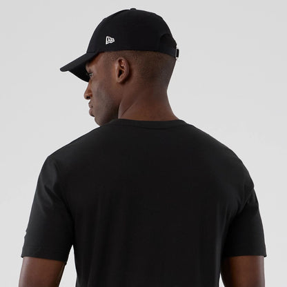 The model is wearing this NBA Hardwood Classic Charlotte Hornets T-Shirt in black. 6