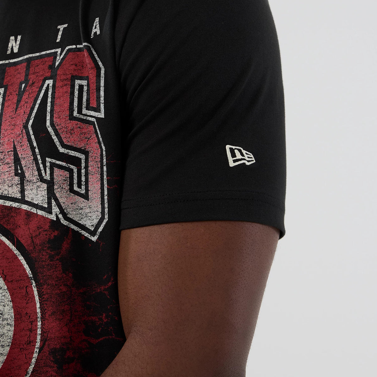The model is wearing this NBA Hardwood Classic Atlanta Hawks T-Shirt in black. 4