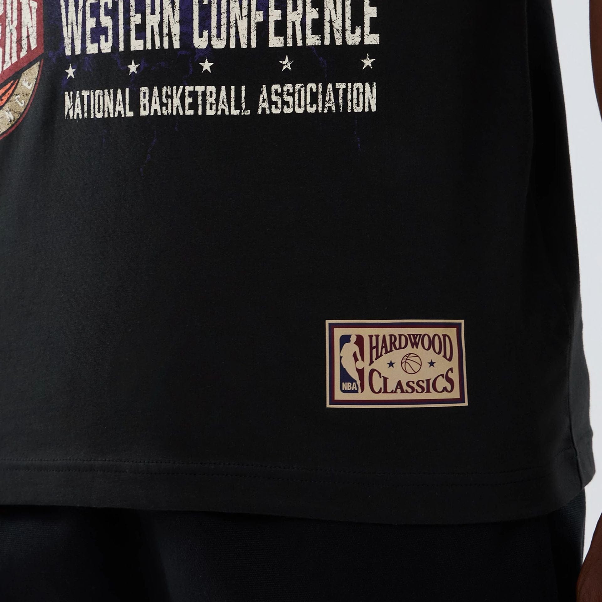 The model is wearing this NBA Hardwood Classic Utah Jazz T-Shirt in black. 5