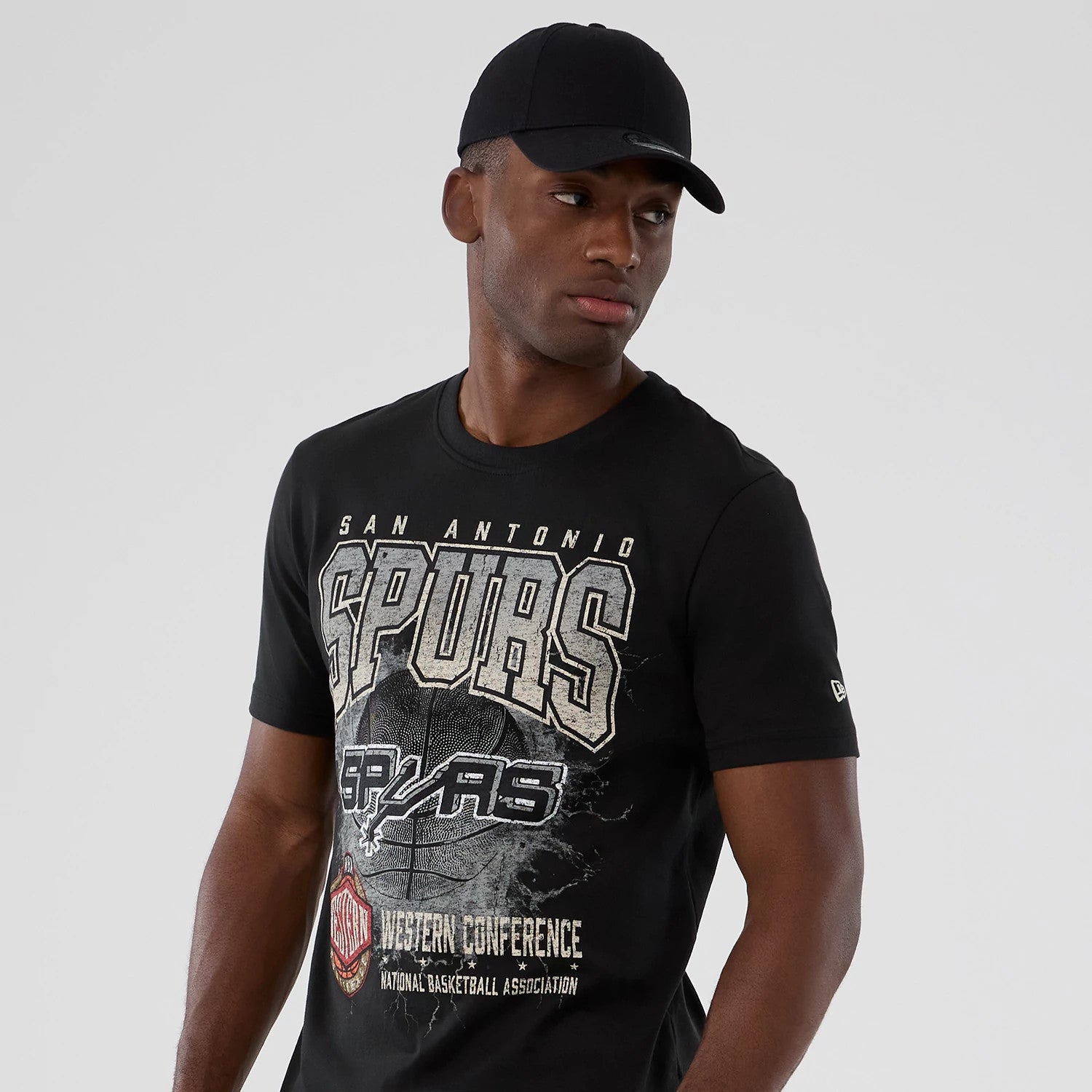 The model is wearing this NBA Hardwood Classic San Antonio Spurs T-Shirt in black. 3