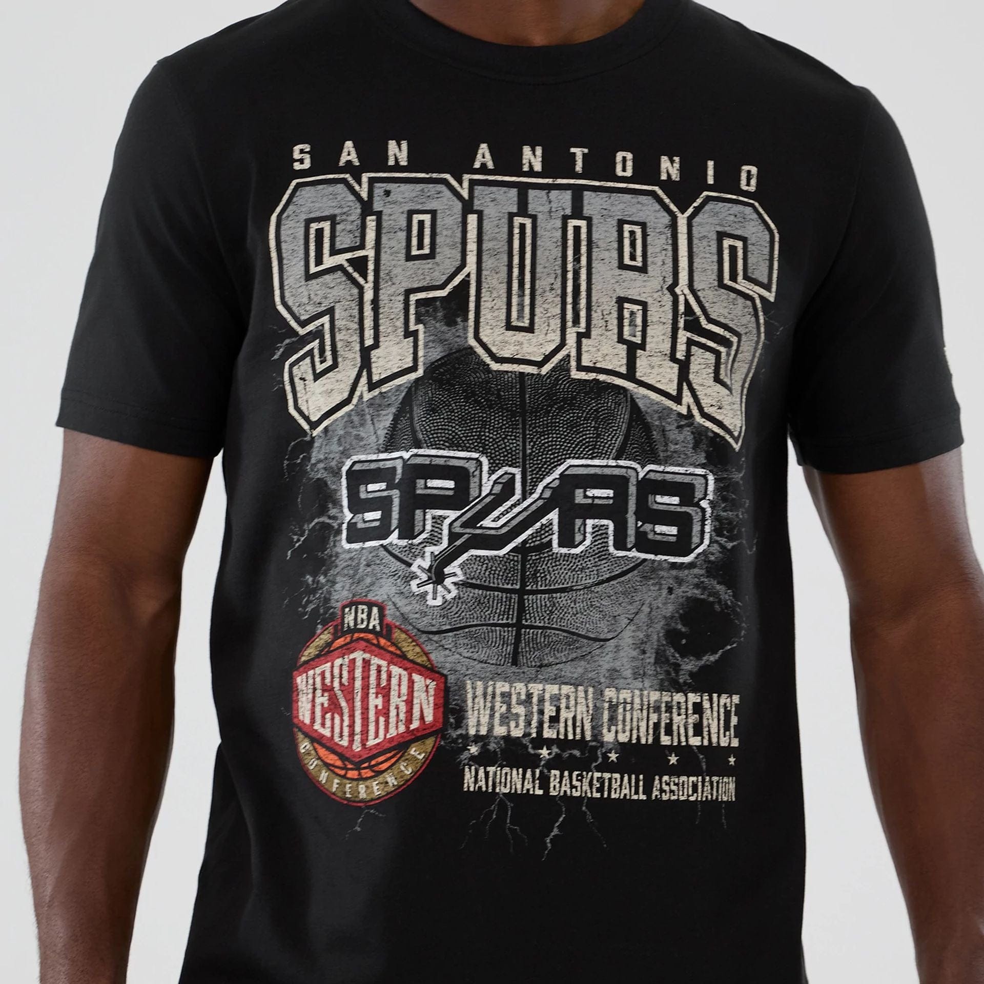 The model is wearing this NBA Hardwood Classic San Antonio Spurs T-Shirt in black. 3