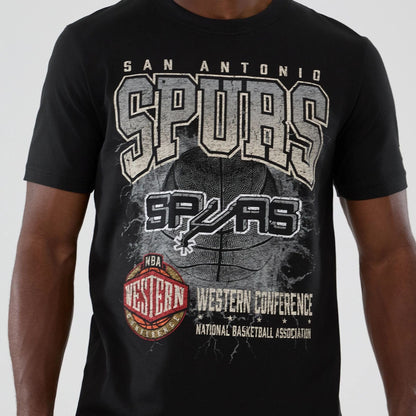 The model is wearing this NBA Hardwood Classic San Antonio Spurs T-Shirt in black. 3