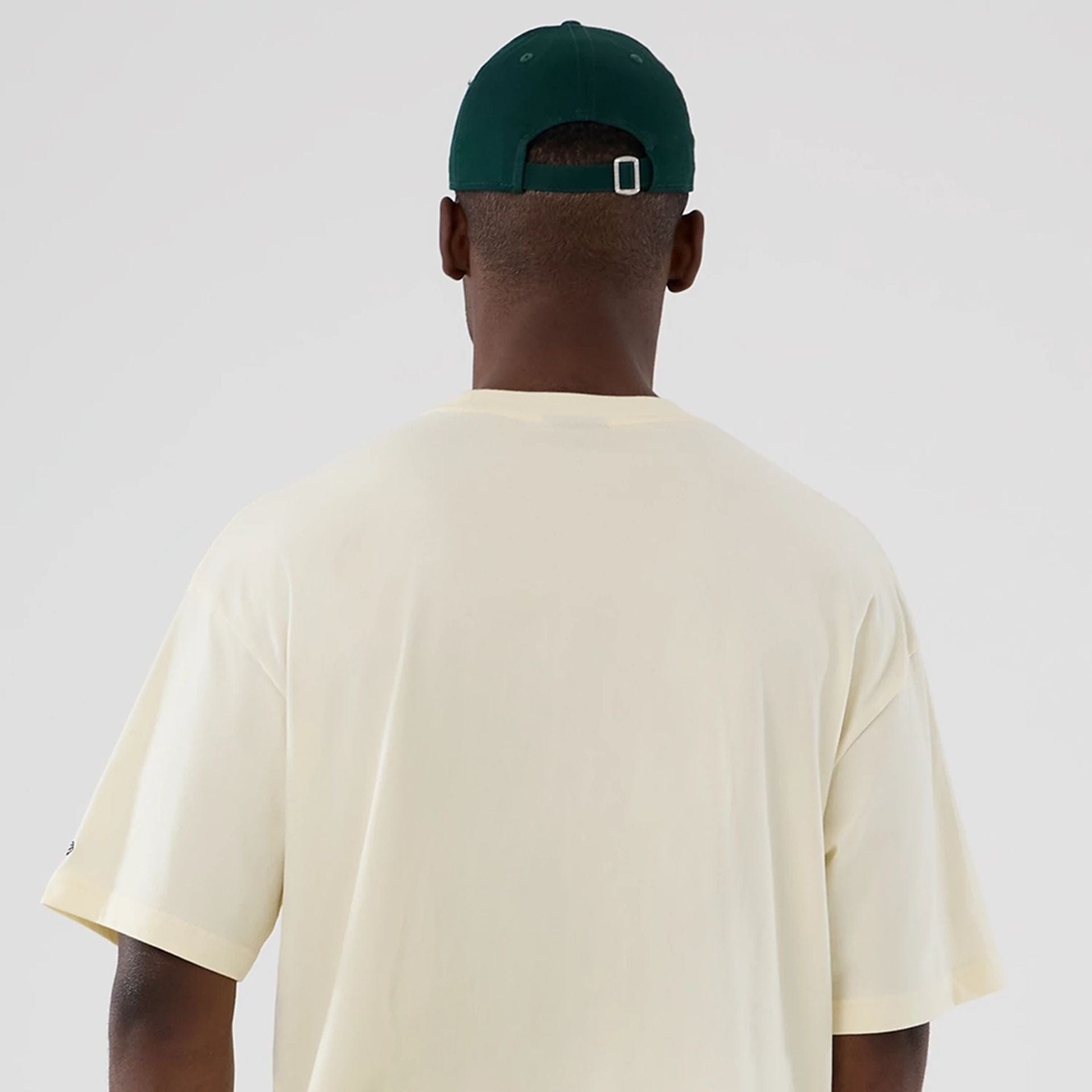 The model is wearing this NBA Hardwood Classic Boston Celtics T-Shirt in cream. 6