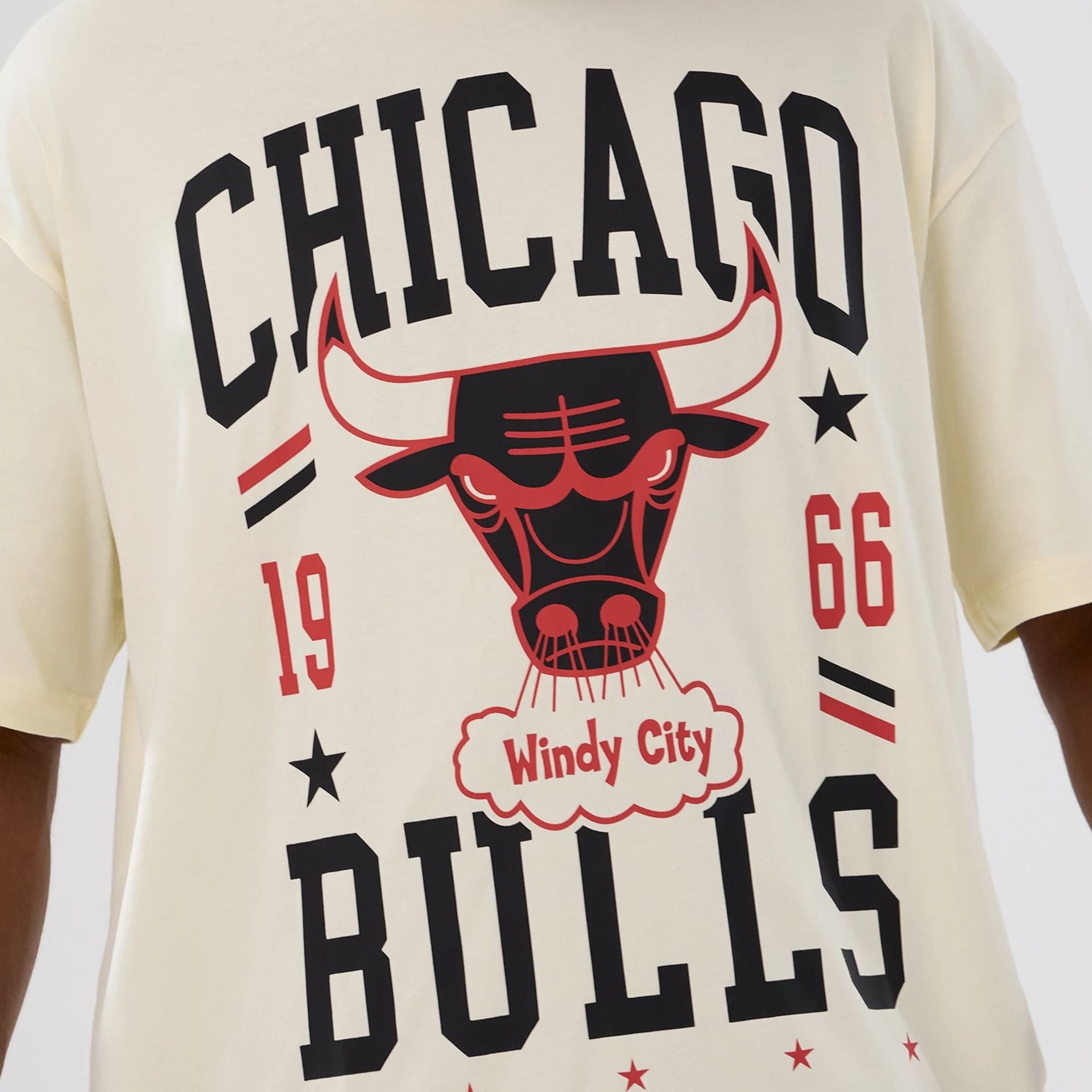 The model is wearing this NBA Hardwood Classic Chicago Bulls T-Shirt in cream. 3