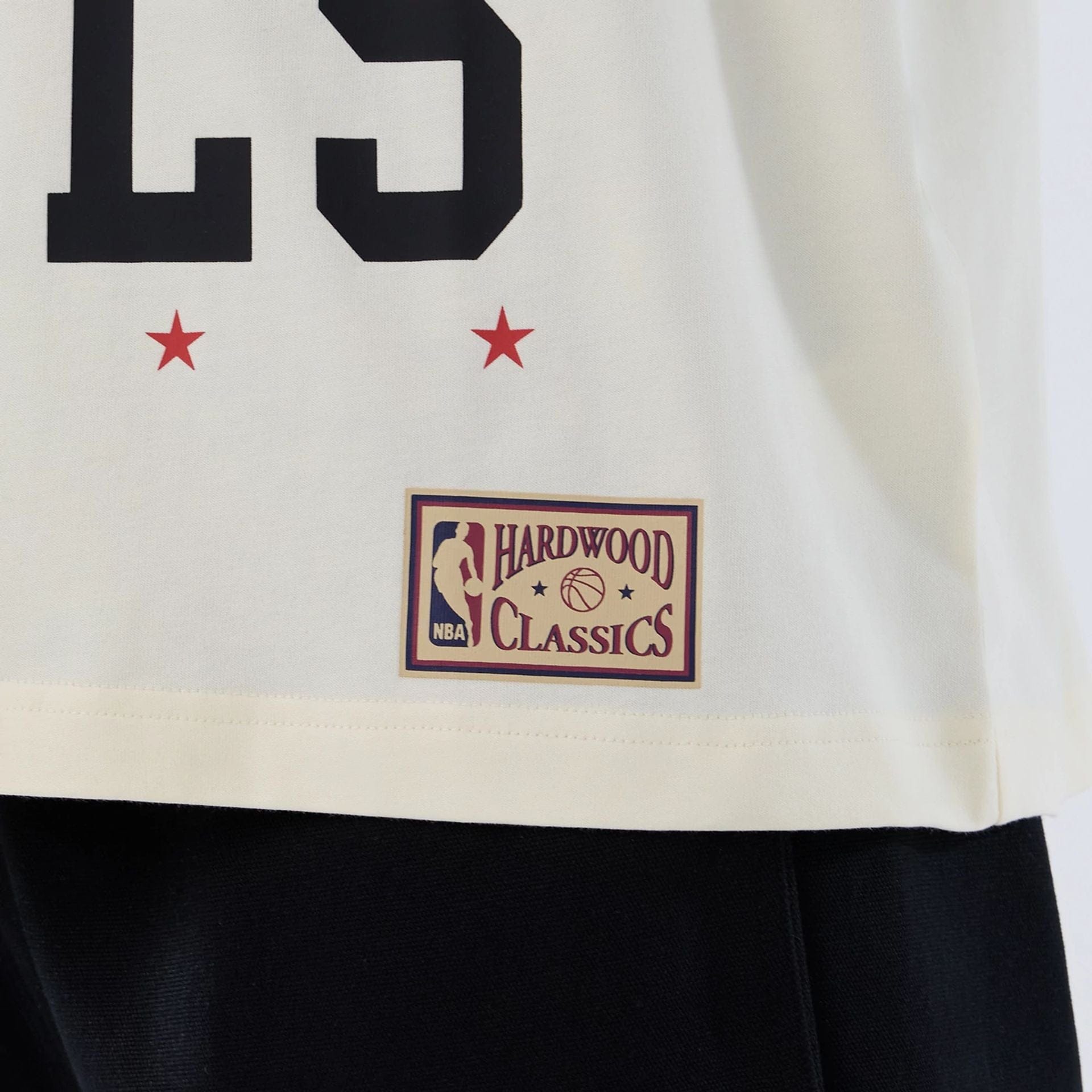 The model is wearing this NBA Hardwood Classic Chicago Bulls T-Shirt in cream. 5