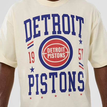 The model is wearing this NBA Hardwood Classic Detroit Pistons T-Shirt in cream. 3