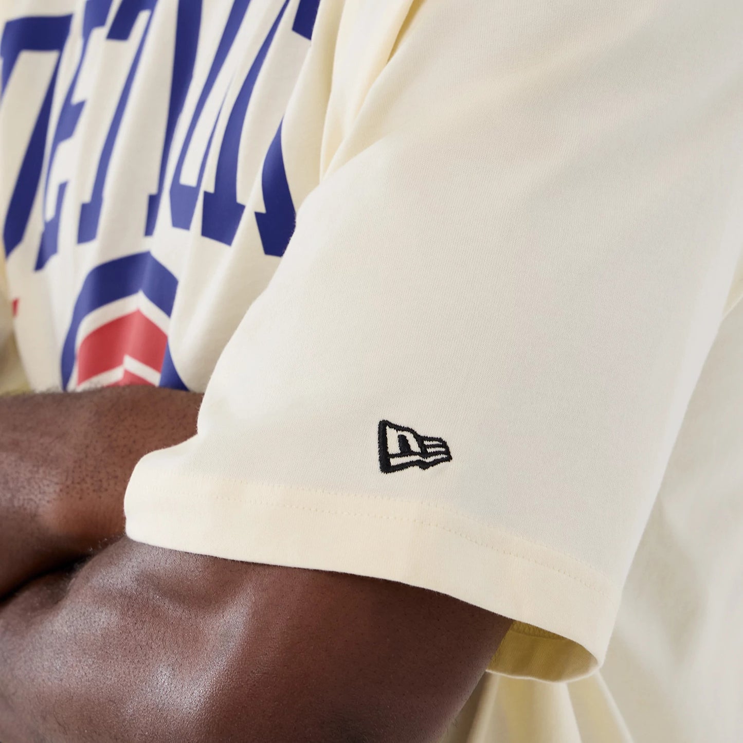 The model is wearing this NBA Hardwood Classic Detroit Pistons T-Shirt in cream. 4