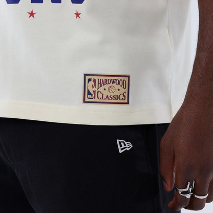 The model is wearing this NBA Hardwood Classic Detroit Pistons T-Shirt in cream. 5