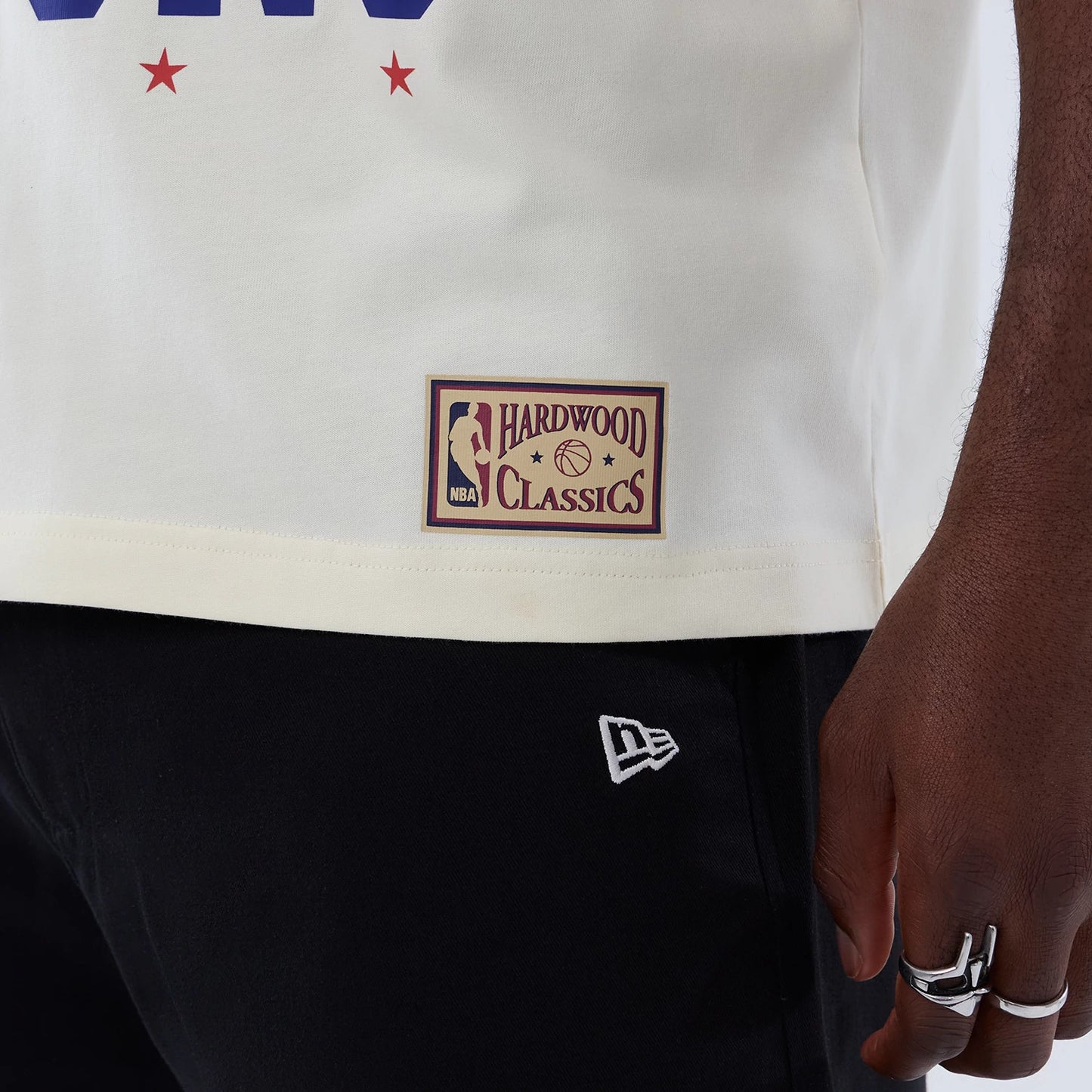 The model is wearing this NBA Hardwood Classic Detroit Pistons T-Shirt in cream. 5