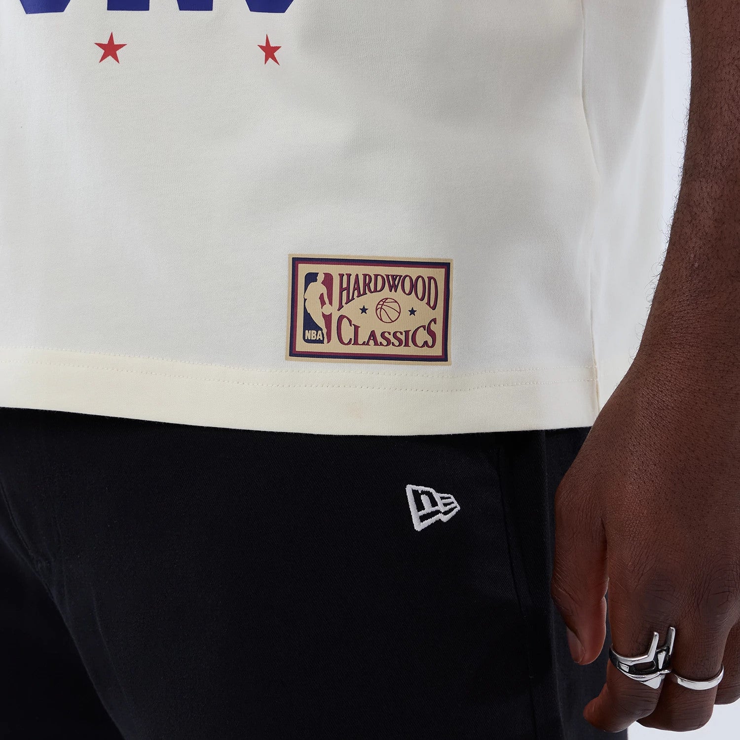 The model is wearing this NBA Hardwood Classic Detroit Pistons T-Shirt in cream. 5