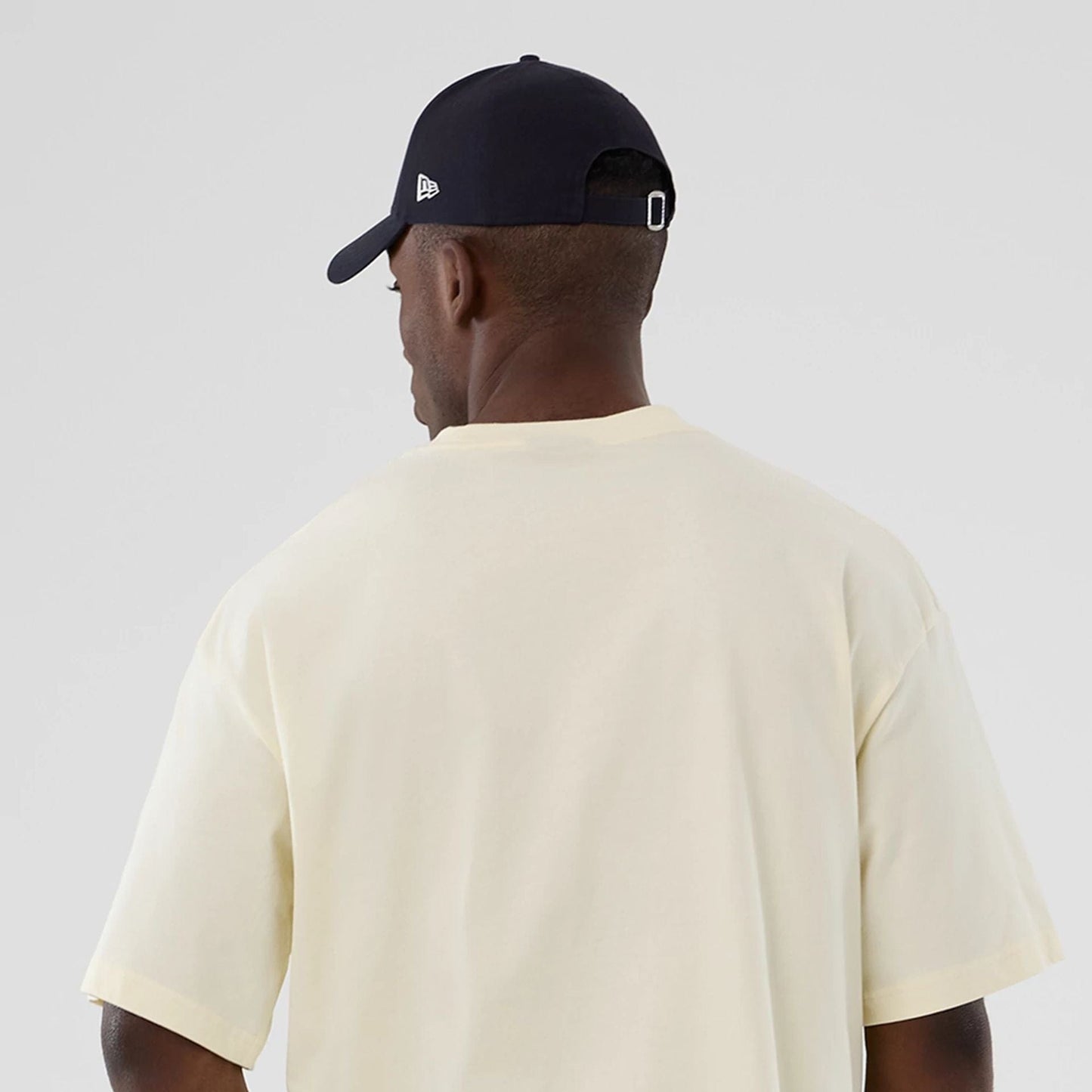 The model is wearing this NBA Hardwood Classic Detroit Pistons T-Shirt in cream. 6