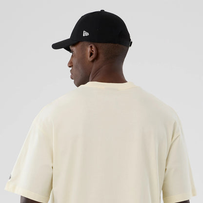 The model is wearing this NBA Hardwood Classic LA Lakers T-Shirt in cream. 7
