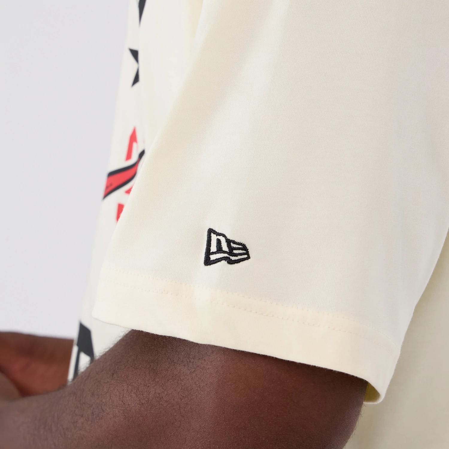 The model is wearing this NBA Hardwood Classic Toronto Raptors T-Shirt in Cream . 4