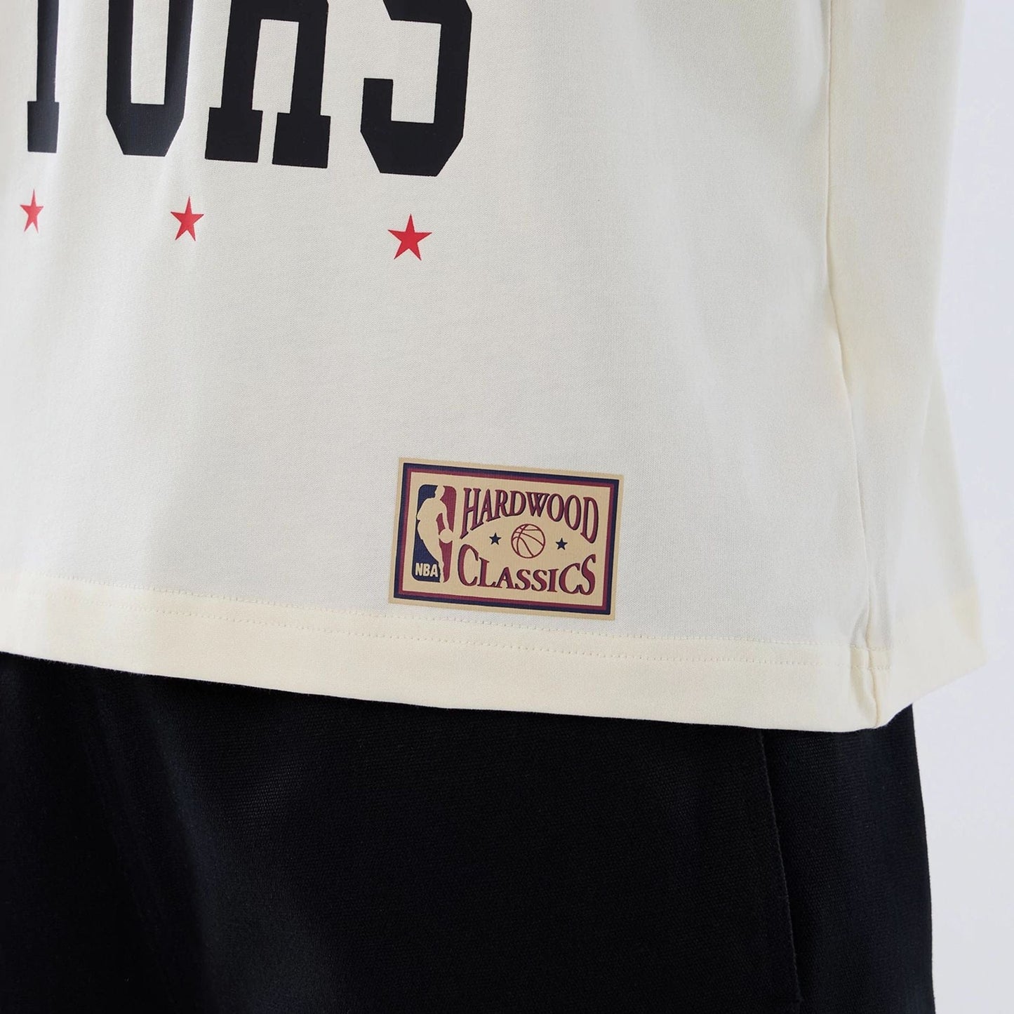 The model is wearing this NBA Hardwood Classic Toronto Raptors T-Shirt in Cream . 5